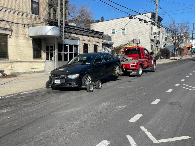 A black car being towed